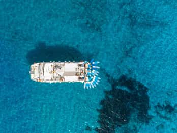 Ibiza: Formentera Cruise w/ Open Bar, Paella & Water Sports