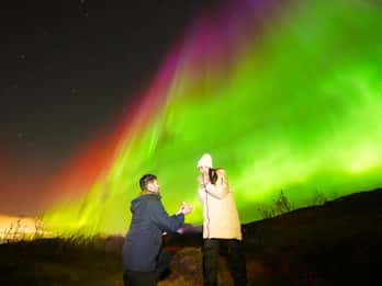 Aurora chase by minibus with a free aurora portrait