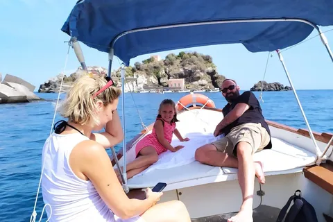 Aci Trezza boat tour sunset and dinner sicilian family home