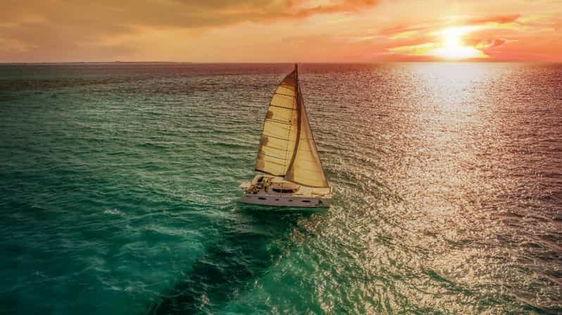 Grand Bay: Sunset Catamaran Cruise with Dinner Party