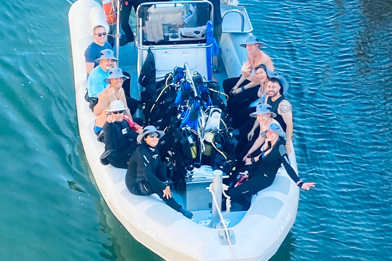 Menorca: Bautizo buceo desde barco con fotos incluidas