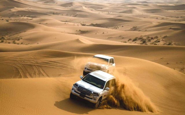 Dubai: Jeep Desert Safari, Camel Ride, and Quad Bike Tour
