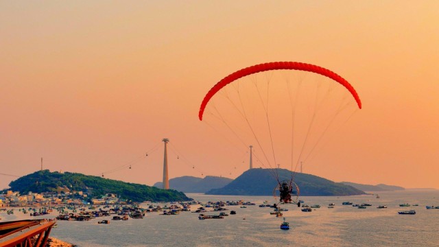 Visit Phu Quoc Enjoy Sunset by Paragliding in Phu Quoc Island, Vietnam