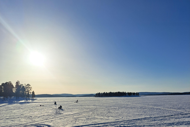 From Saariselkä: Ice Fishing Tour with Open Fire Cooking