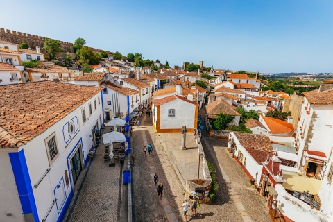 From Lisbon: Fatima, Obidos, Batalha and Nazaré Group Tour Tour in Spanish w/ Pickup from VIP Executive Éden Aparthotel