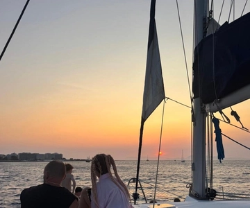 Rhodes: Sunset Catamaran Cruise with Fruits & Drinks