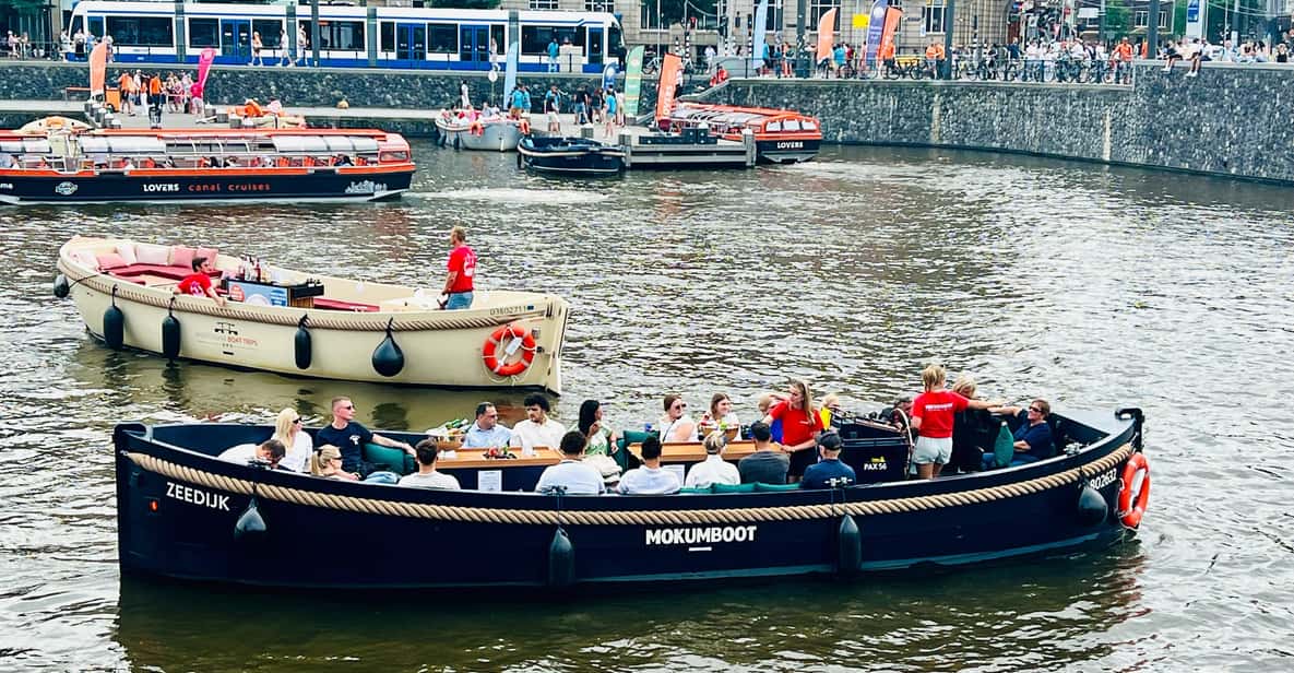 Afbeelding 4 van Amsterdam: grachtenrondvaart met gids en drankjesoptie