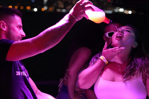 Miami: Booze Cruise Boat Party with DJ, Snacks, & Open Bar