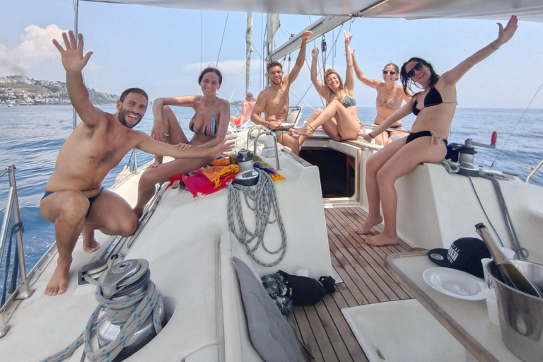 Sunset aperitif on a sailing boat in Catania