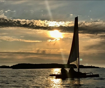 Exclusive to Norway, Sommarøy: Midnight sun in a Hobie sailing kayak.