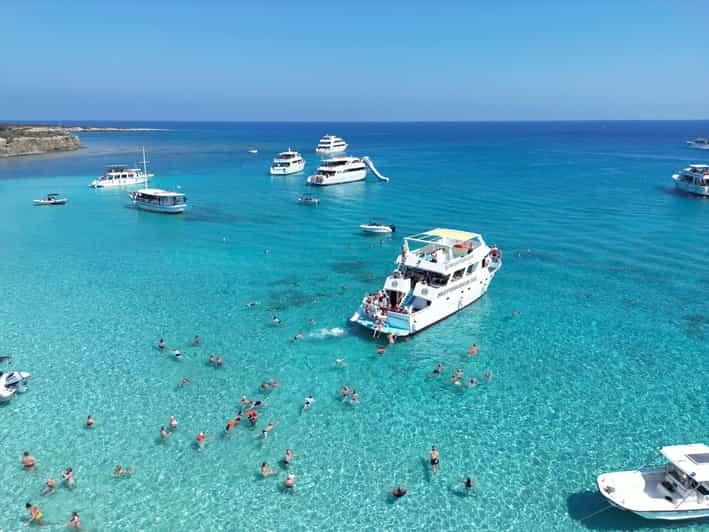 Paphos/Akamas: Blue Lagoon Bus & Boat Tour with Water Slide