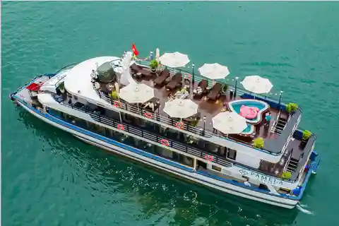 Crucero de un día por Ha Long con kayak y fiesta al atardecer