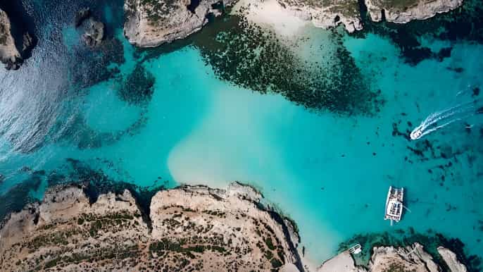 De Sliema: Cruzeiro Noturno na Hora Dourada à Lagoa Azul