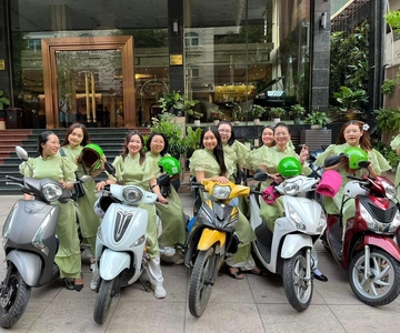 Saigon: Night Sights & Local Food Tour w Ao Dai Rider Option