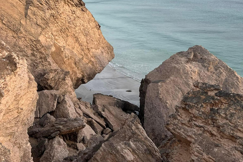 East Salalah by Day & Night: Camels, Waterfalls & Souqs Tour