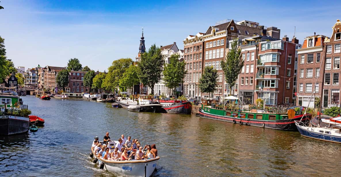 Afbeelding 7 van Amsterdam: Grachtenrondvaart met gids in een open boot langs hoogtepunten