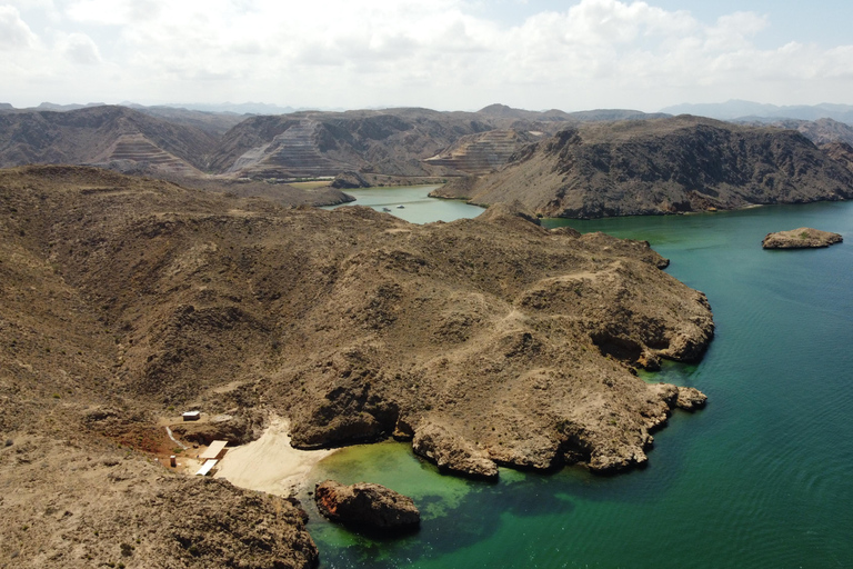 Bandar Al Khayran: Snorkeling with included Waterproof case Snorkeling Experience with Marina Meeting Point
