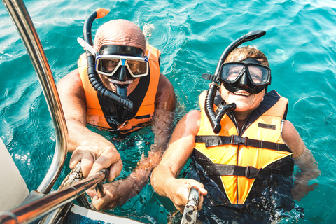 From Cancún: Catamaran Cruise with Open Bar, Snorkeling, and Lunch Basic tour with drinks included