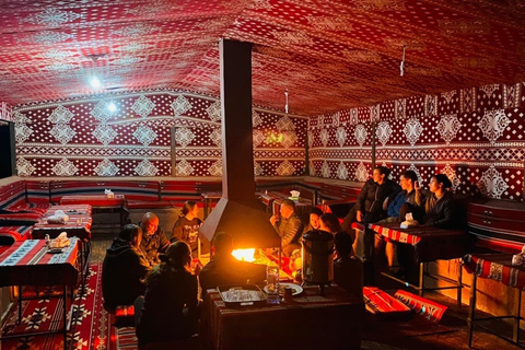 overnight: sleep under the stars in the cave in Wadi Rum Protected Area Caml tour