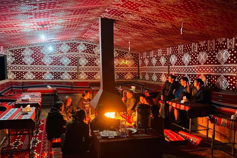 overnight: sleep under the stars in the cave in Wadi Rum Protected Area Caml tour