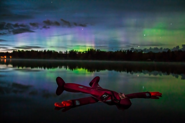 Rovaniemi: Ice Floating under Aurora Borealis