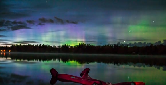 Rovaniemi: Ice Floating under Aurora Borealis
