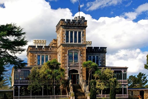 Depuis Port Chalmers : La ville, les curiosités et le château de Larnach