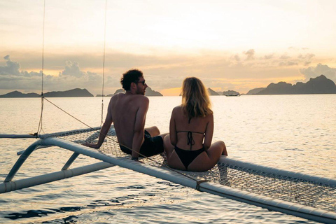 El Nido: Private Falls, Surf & Sunset Sailing Experience