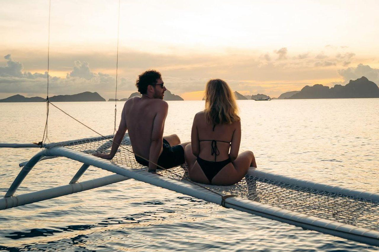 El Nido: Private Falls, Surf & Sunset Sailing Experience