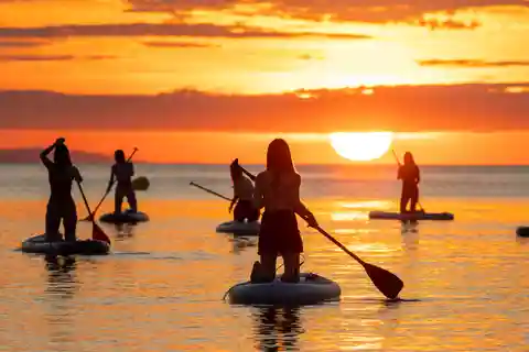 Barcelona: Sunrise Paddleboarding with Instructor and Photos