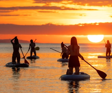 Barcelona: Sunrise Paddleboarding with Instructor and Photos