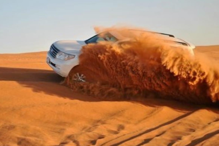 Doha: woestijnsafari bij zonsondergang met kameelrit en sandboarden