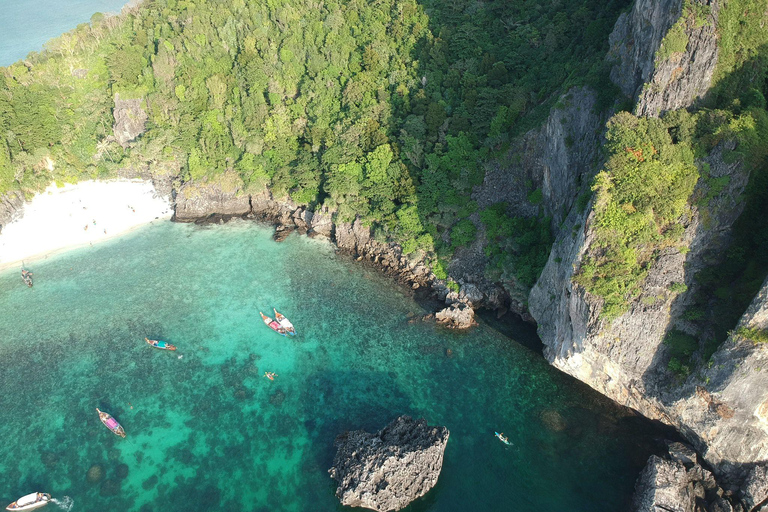 Phi Phi: 7 Islands longtail boat with Sunset and Plankton