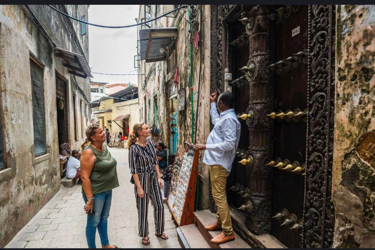 DE NUNGWI: CIDADE DE PEDRA, EXCURSÃO À QUINTA DE ESPECIARIAS E ILHA PRISONAL