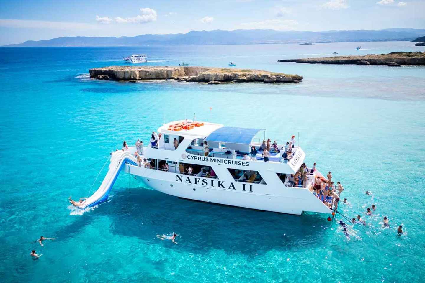 BBQ Boat: Nafsika II Sunset BBQ, Waterslide & Swimming Trip