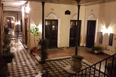 Buenos Aires: tango in an old tenement house + glass of wine.