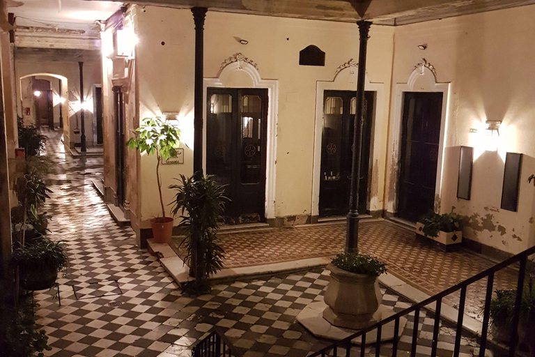 Buenos Aires: tango in an old tenement house + glass of wine.