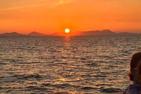 From Lefkimmi: Blue Lagoon Sunset Glass-Bottom Boat Cruise