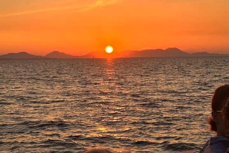 From Lefkimmi: Blue Lagoon Sunset Glass-Bottom Boat Cruise