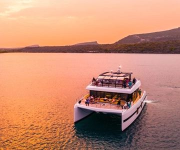 Caracasbaai: All-Inclusive feest bij zonsondergang op een catamaran