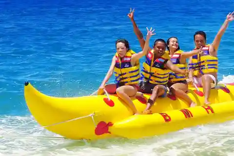 Sharm: Banana, Sofa Boat or Parasailing watersports & pickup