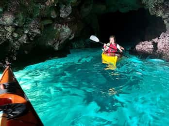 Excursión en kayak por Porto Selvaggio + buceo en acantilados + aguas termales