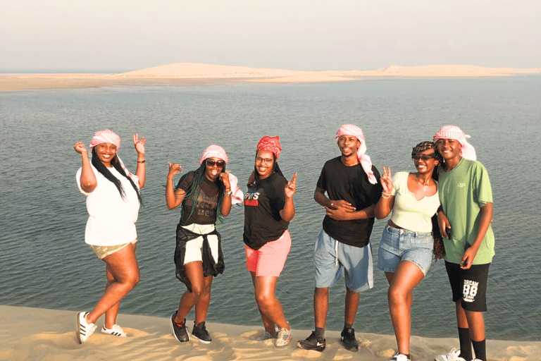 Qatar: Sunset Desert Safari with Camel Ride &amp; Sandboarding..Sharing Tour