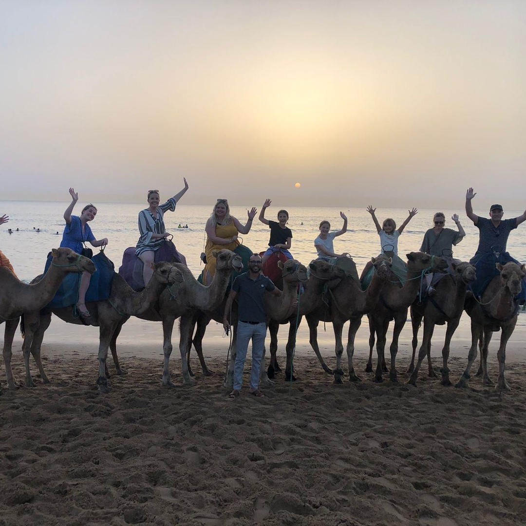 Caves, sunset, camel ride with beach view & barbecue dinner