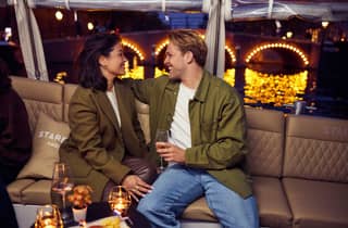 Amsterdam: Abendliche Grachtenfahrt mit Lichtermeer & Drinks