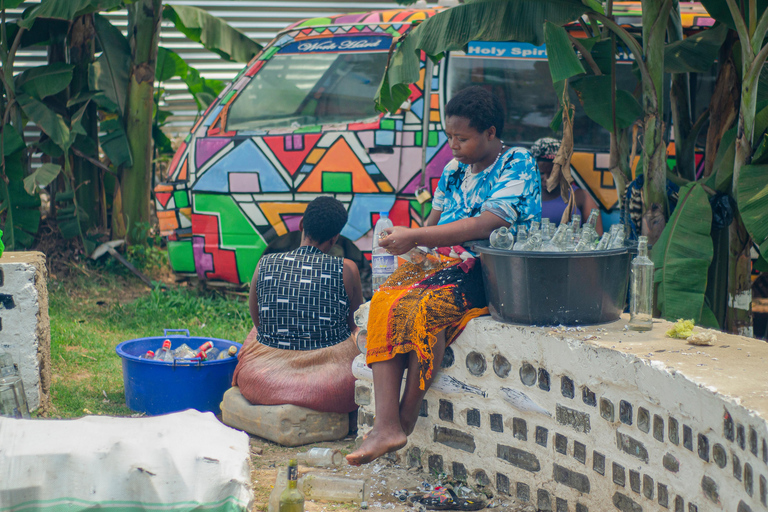 Kampala: Glassblowing, Beadmaking, and More Art Experience Blowing Glass Bubbles