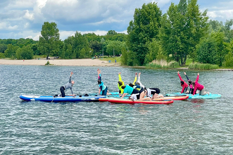 SUP Yoga on Cospudener See SUP yoga on Lake Cospuden