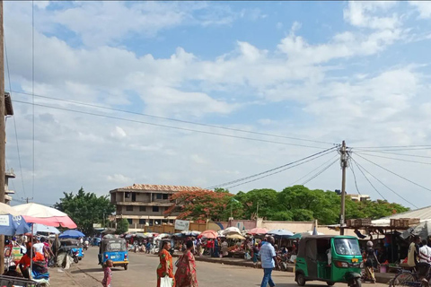 Moshi or Arusha: Guided Town Tour , Market and shopping By using- Tuku Tuku