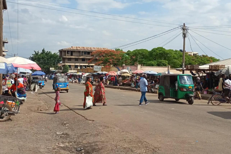 Moshi or Arusha: Guided Town Tour , Market and shopping By using- Tuku Tuku