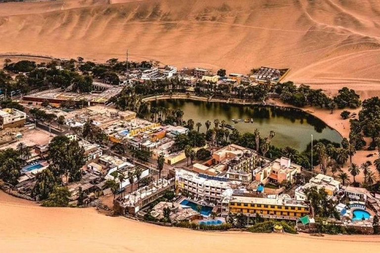 Sandboarding en el desierto de Ica al atardecer